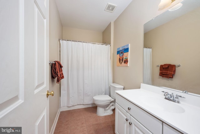 bathroom featuring vanity, toilet, curtained shower, and tile patterned flooring