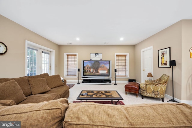 living room featuring light colored carpet