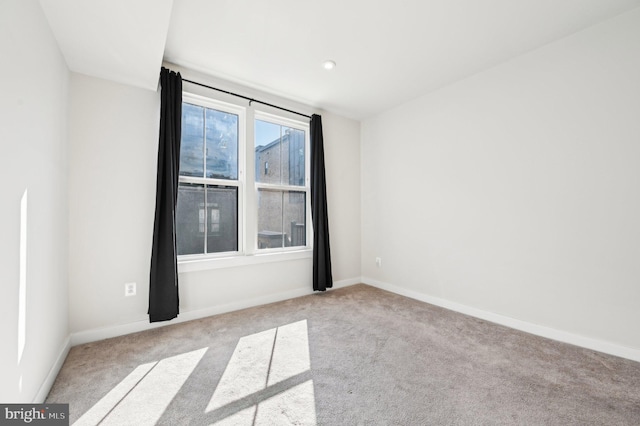 view of carpeted spare room