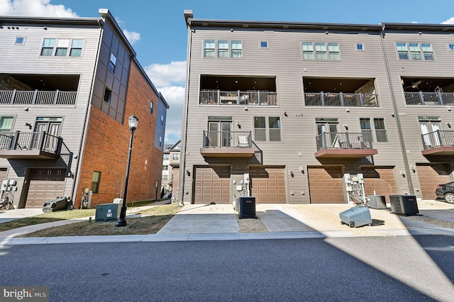 view of property featuring central AC unit