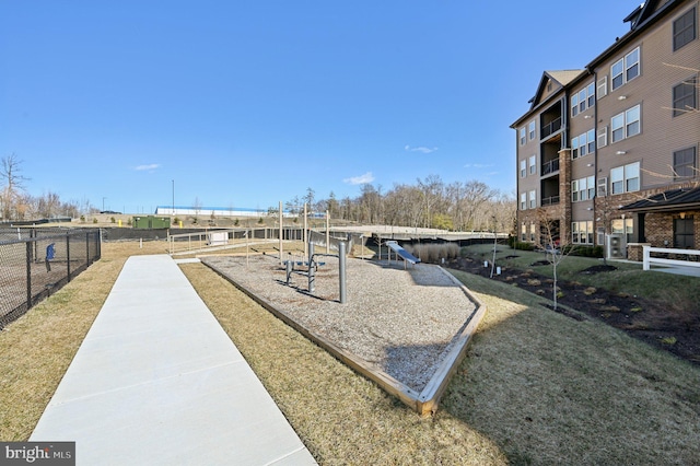 view of community featuring a lawn