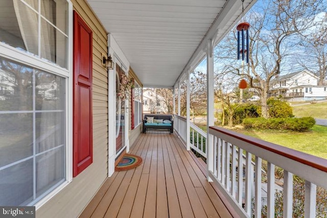 wooden terrace with covered porch