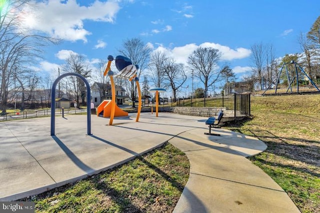 view of playground with basketball court