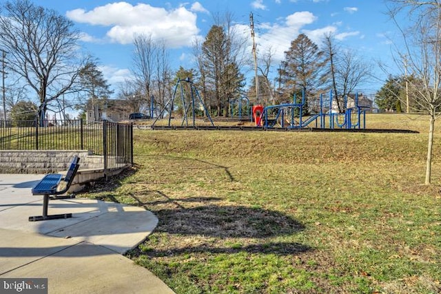 surrounding community featuring a yard and a playground