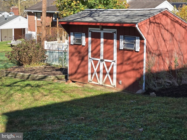 view of outdoor structure with a yard