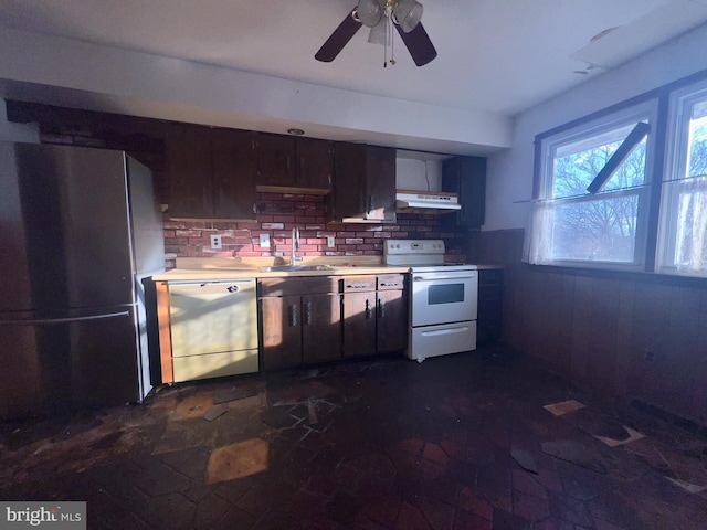 kitchen with sink, refrigerator, dark brown cabinets, dishwasher, and white range with electric stovetop