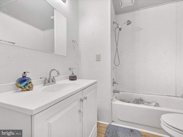 full bathroom with vanity, tub / shower combination, and toilet