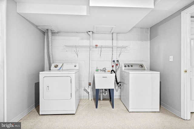 laundry room with washer and dryer