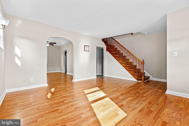 interior space featuring ceiling fan and light wood-type flooring