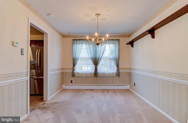 unfurnished dining area with a baseboard radiator, a chandelier, and light colored carpet