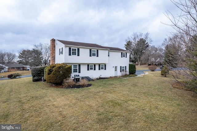 exterior space with a front yard