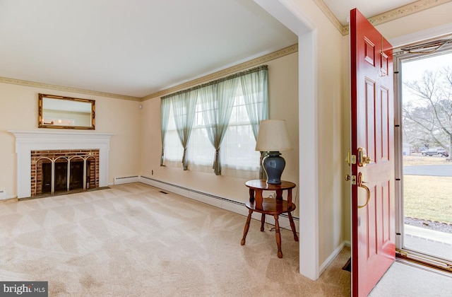 carpeted entryway with a baseboard heating unit, a fireplace, and ornamental molding