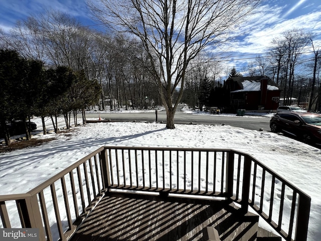 view of snow covered deck