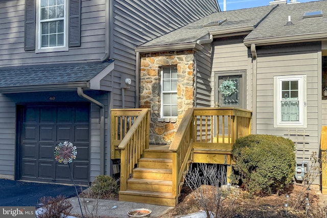 property entrance with a garage