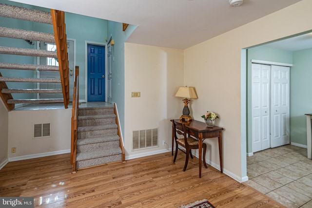 foyer entrance featuring light hardwood / wood-style flooring