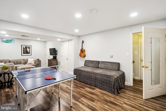 recreation room featuring recessed lighting, visible vents, baseboards, and wood finished floors