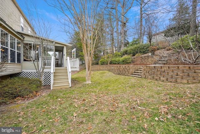 view of yard with a sunroom