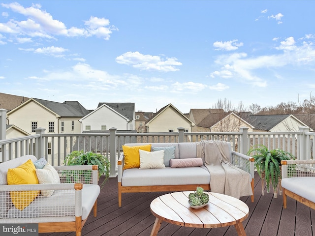 wooden deck with an outdoor hangout area