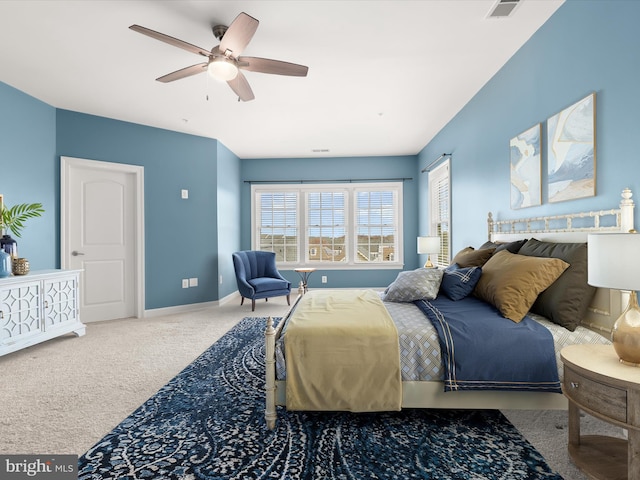 carpeted bedroom with ceiling fan