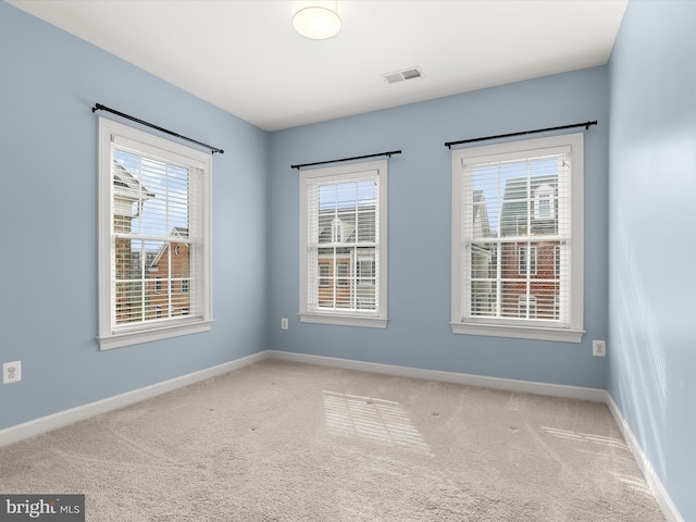 view of carpeted spare room