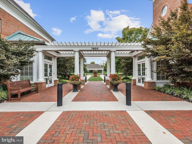 view of patio / terrace with a pergola and french doors