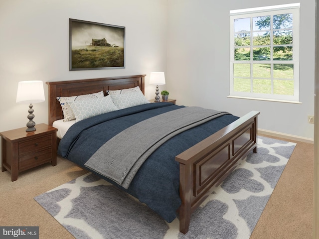 bedroom featuring light colored carpet