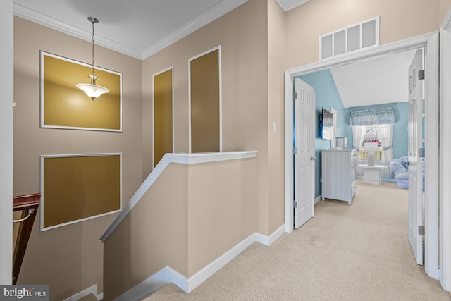 corridor featuring light colored carpet, visible vents, ornamental molding, an upstairs landing, and baseboards