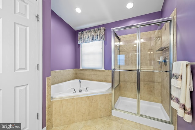 bathroom featuring tile patterned flooring, a garden tub, a shower stall, and recessed lighting