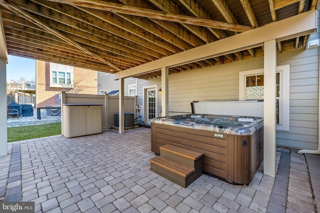 view of patio featuring a hot tub