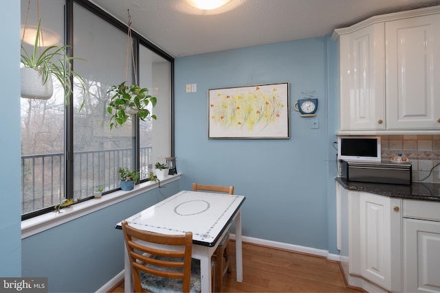 dining room featuring light wood-type flooring