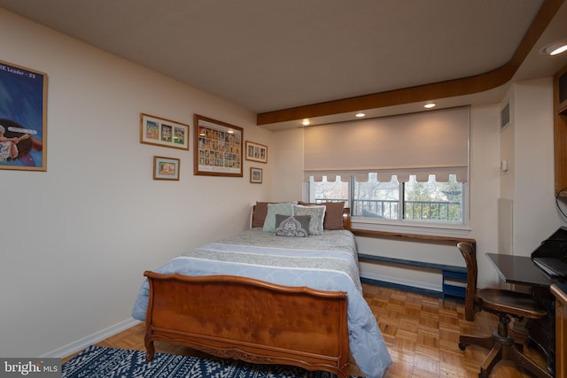 bedroom featuring parquet floors