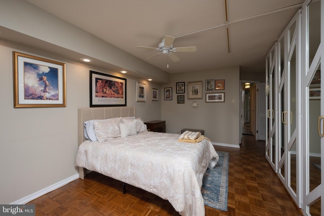 bedroom with dark parquet floors