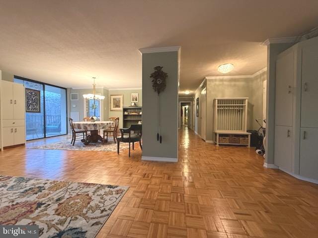 hallway featuring light parquet floors, ornamental molding, and an inviting chandelier