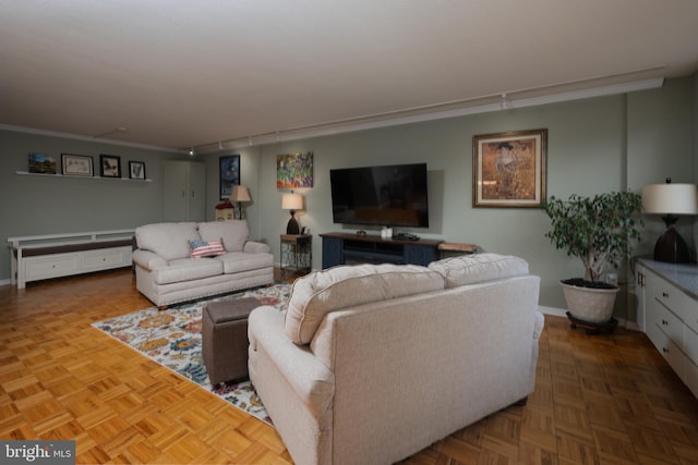 living room with parquet floors and ornamental molding