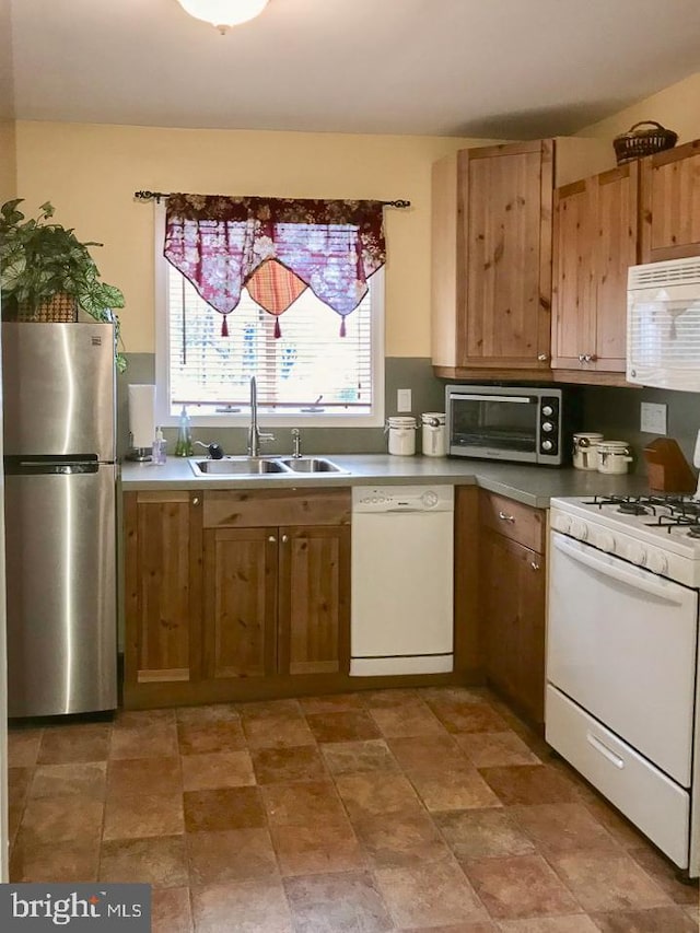 kitchen featuring sink and appliances with stainless steel finishes