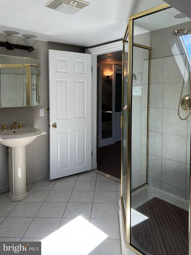 bathroom featuring tile patterned floors and walk in shower