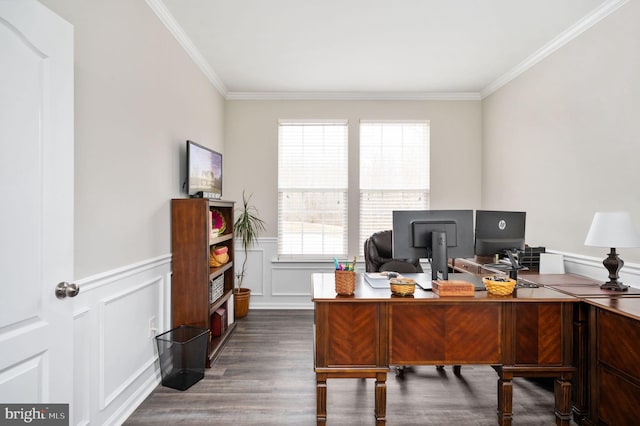 office area with crown molding, a decorative wall, dark wood-style floors, and a wainscoted wall