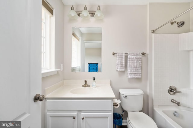 full bath with shower / bathtub combination, toilet, and vanity