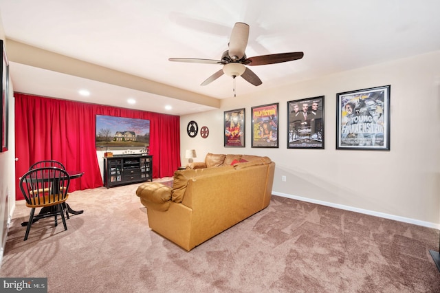 carpeted living area featuring recessed lighting, baseboards, and ceiling fan