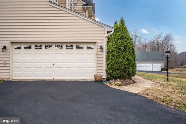 garage with driveway