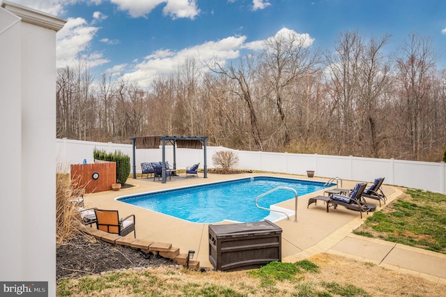 view of pool featuring a patio area, a fenced backyard, a fenced in pool, and a pergola