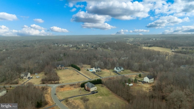 aerial view featuring a rural view and a view of trees