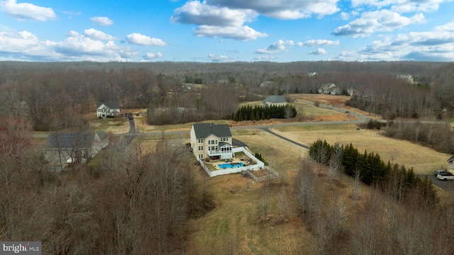 aerial view with a view of trees and a rural view