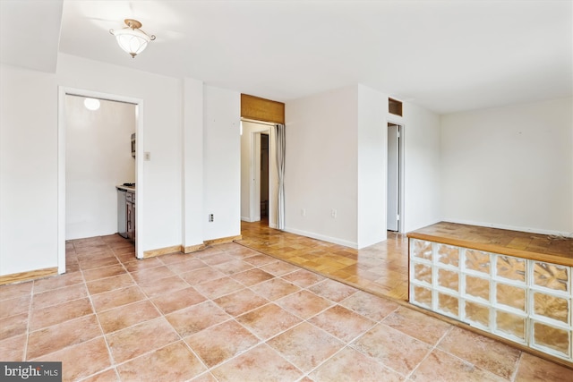 view of tiled spare room