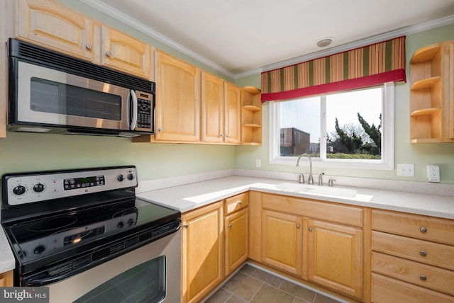 kitchen featuring ornamental molding, stainless steel appliances, light brown cabinetry, and sink