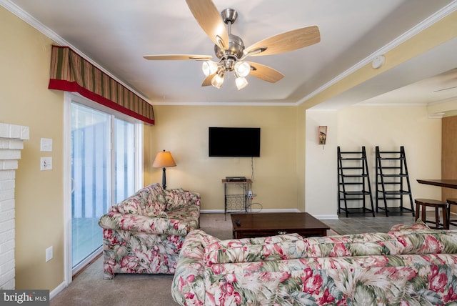 living room with ornamental molding, ceiling fan, and dark colored carpet