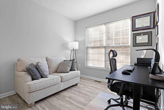 home office featuring light wood-type flooring