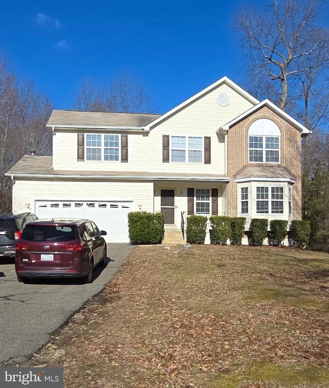 view of property featuring a garage