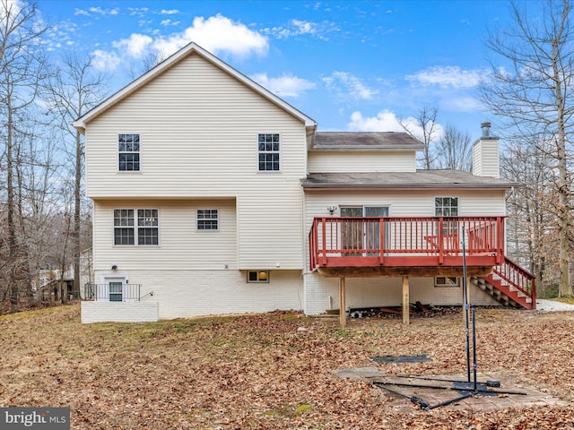 back of property featuring a deck