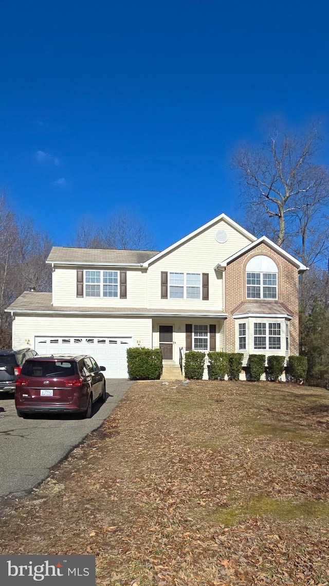 view of property with a garage